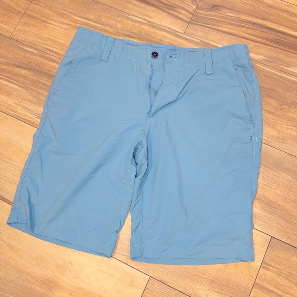 Under Armour Golf Short Size 34. 11” inseam. Heather/steal blue color like new.